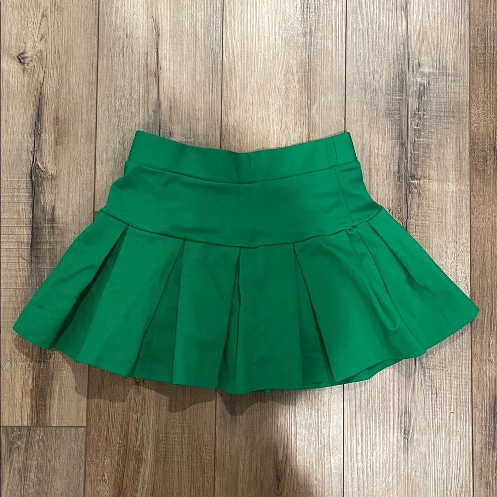 Green pleated skirt with built in shorts size medium
